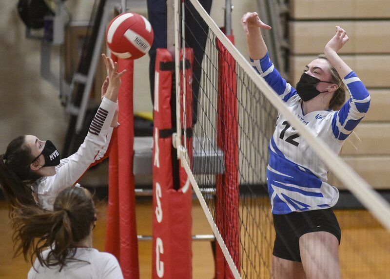 SERVE'S UP: Danvers volleyball welcomes Masconomet to NEC with four set triumph